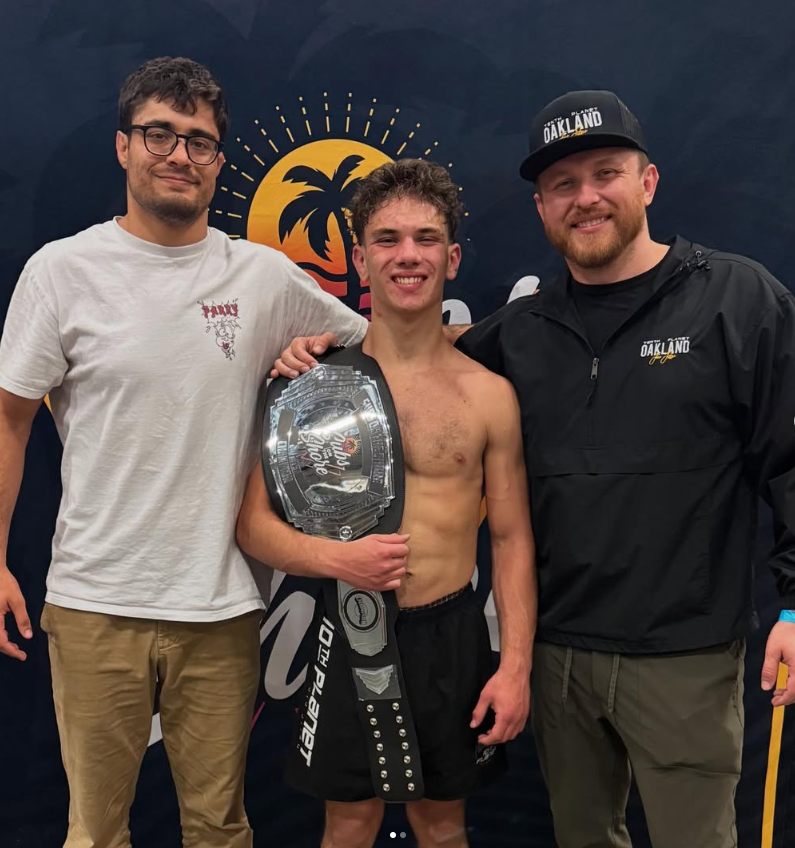 138-pound Jonny Mezheritskiy with Michael Hillebrand after winning the 155-pound Subs on the Shore championship