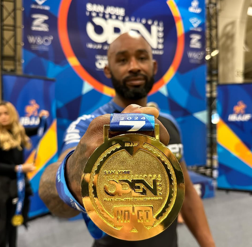 10th Planet Oakland wrestling coach Anthony Ancheta with his gold medal at the 2024 IBJJF San Jose Open