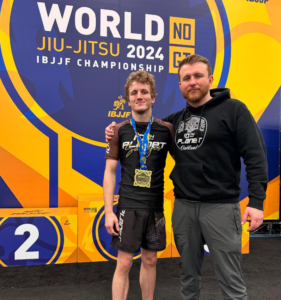 Corbin Bilund with Michael Hillebrand after earning bronze at the 2024 IBJJF No-Gi World Championship