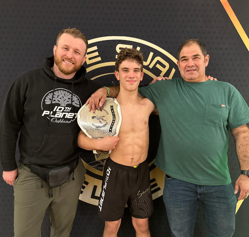 Jonny Mezheritskiy with the Arte Suave 135-pound championship belt at 10th Planet Oakland