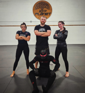 Michael Hillebrand, Bre Stikk and the 10th Planet Oakland team testing the Rollbot Jiu Jitsu training dummy