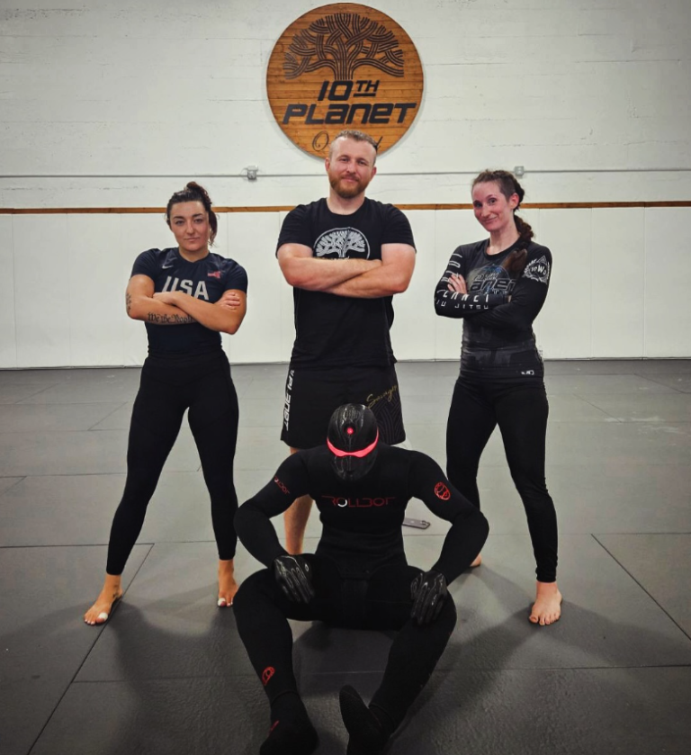 Michael Hillebrand, Bre Stikk and the 10th Planet Oakland team testing the Rollbot Jiu Jitsu training dummy