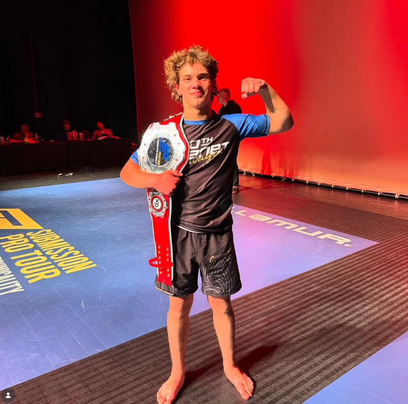 Jonny Mezheritskiy with the 145-pound Submission Pro Tour championship belt representing 10th Planet Oakland