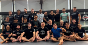 Michael Hillebrand and Damon Nguyen with Jiu Jitsu students at a seminar in Vietnam before opening 10th Planet Saigon