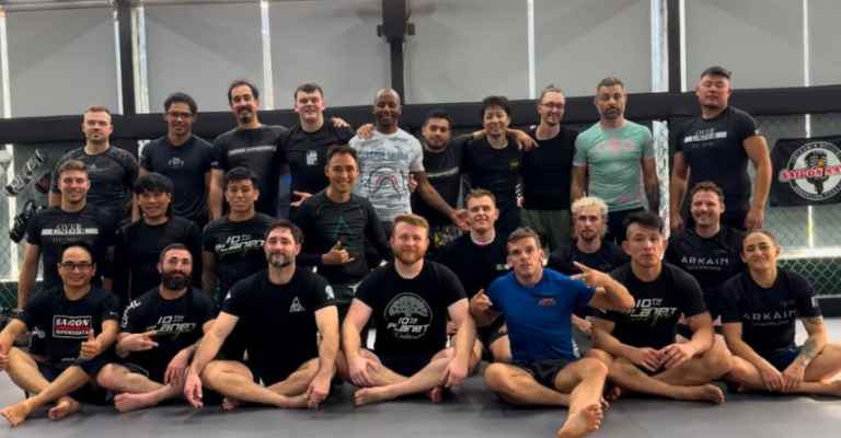 Michael Hillebrand and Damon Nguyen with Jiu Jitsu students at a seminar in Vietnam before opening 10th Planet Saigon