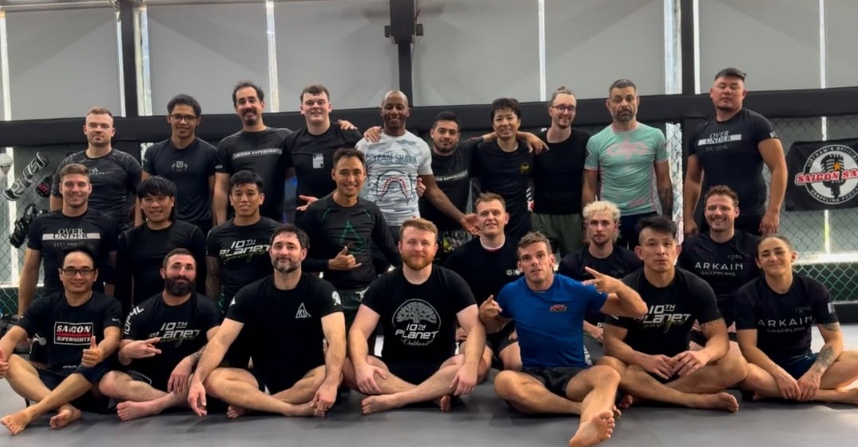 Michael Hillebrand and Damon Nguyen with Jiu Jitsu students at a seminar in Vietnam before opening 10th Planet Saigon